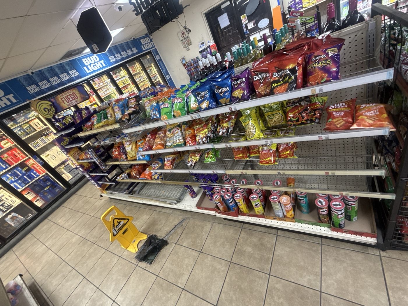 Chip and snack rack with Doritos, Takis, Lay's and Pringles